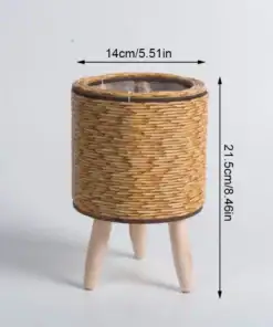 A 14cm wide, 21.5cm tall Rattan Planter Stand with wooden legs on a plain background. | 28Alchemy