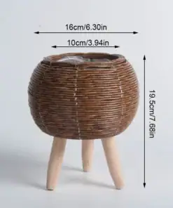 Rattan Planter Stand on three wooden legs, 16cm wide and 19.5cm tall, shown against a white backdrop. | 28Alchemy