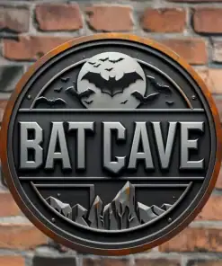 A round sign with "BAT CAVE" and a bat silhouette, mounted on a brick wall. | 28Alchemy