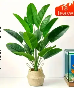 Artificial plant with 18 green leaves in a woven basket, 81.5 cm tall, next to a fish tank with two goldfish. | 28Alchemy