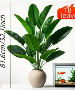 Potted artificial plant with 18 leaves, 81.6cm tall, beside a fish tank with two orange fish. | 28Alchemy