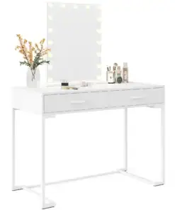White vanity table with drawers, lighted mirror, makeup products, and a vase with yellow flowers on top. | 28Alchemy