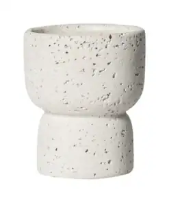 A white, textured ceramic cup with a rounded top and narrower base, resembling a modern, minimalist design. | 28Alchemy