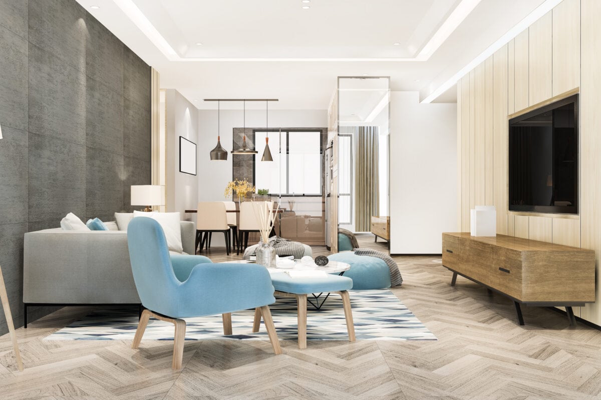Modern living and dining room with light blue chairs, wooden furniture, and neutral tones, featuring large windows and bright lighting. | 28Alchemy