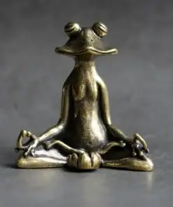 Bronze figurine of a frog sitting cross-legged in a meditative yoga pose on a gray surface. | 28Alchemy