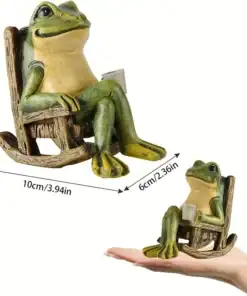 A small frog figurine sits in a rocking chair holding a cup, shown on a hand for scale with measurements labeled. | 28Alchemy