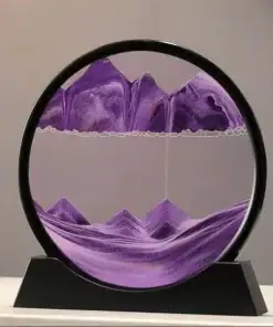 A round sand art frame with purple sand forming mountain-like patterns inside a black stand. | 28Alchemy