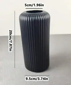 Tall, black, ribbed cylindrical vase with measurements: 20cm high, 9.5cm wide, 5cm opening diameter. | 28Alchemy
