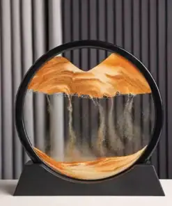 Round sand art display showing orange sand falling and forming layered patterns, set against a background of vertical stripes. | 28Alchemy