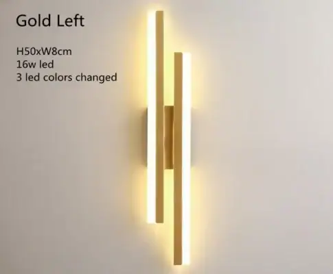 Modern gold wall light with two vertical LED bars, glowing warmly; text lists size, wattage, and color change feature. | 28Alchemy