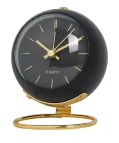 Round black and gold desk clock with gold hands and stand, showing the time as 10:08. | 28Alchemy