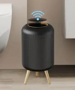 A black smart trash can with wooden legs and a sensor lid, placed in a modern bathroom setting. | 28Alchemy