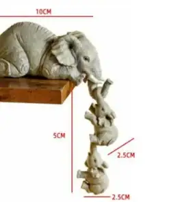 Three small elephant figurines hang from a larger elephant on a shelf; dimensions in centimeters are labeled. | 28Alchemy